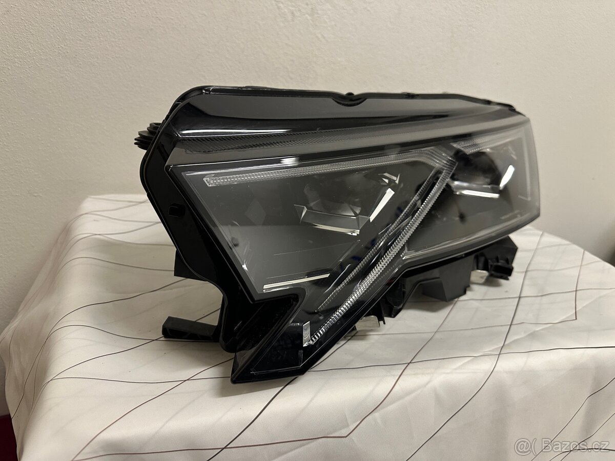 Octavia 4 lift světlo