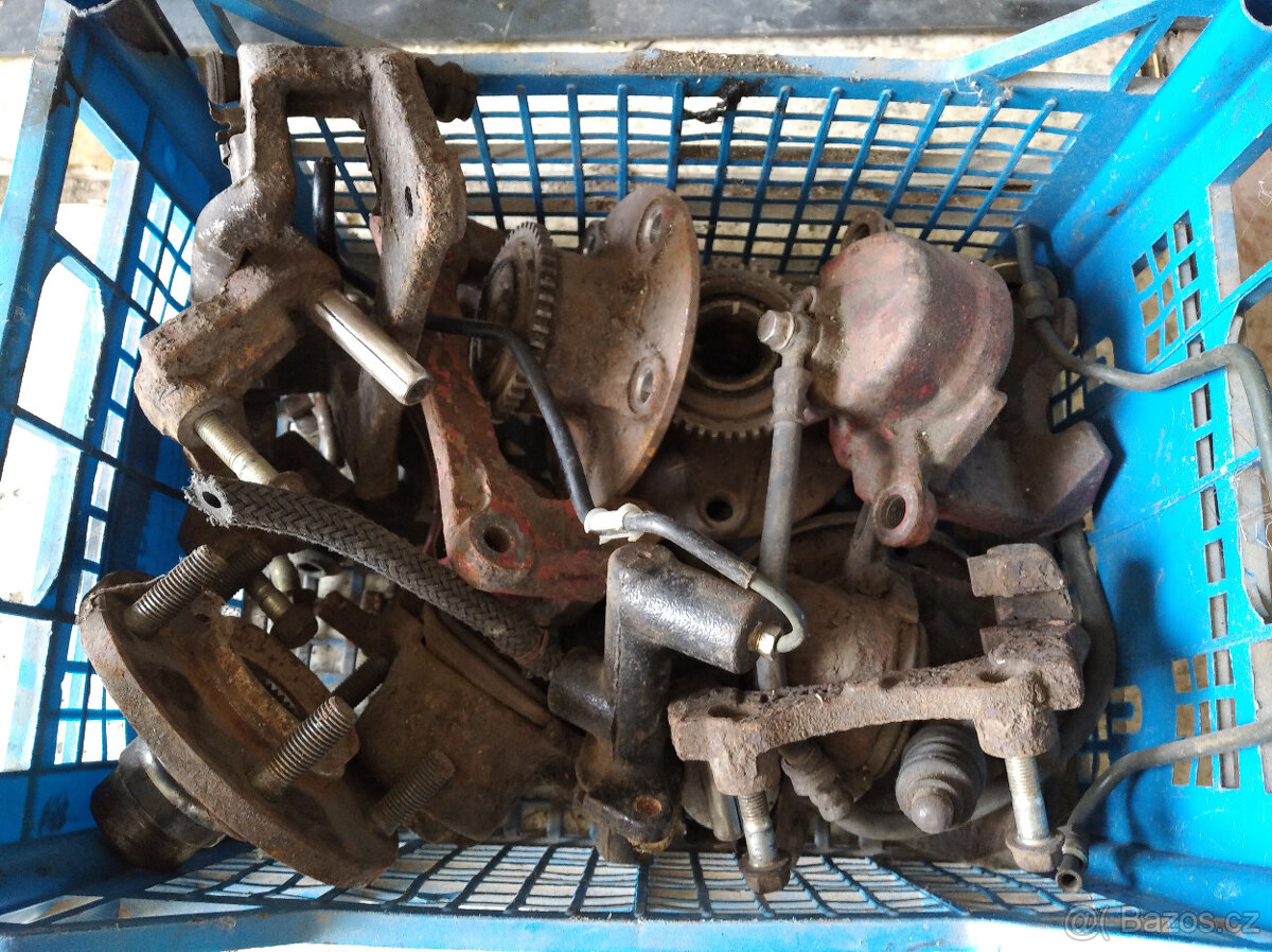 Mazda 323F V6 Brzdové třmeny původní, náboje kol