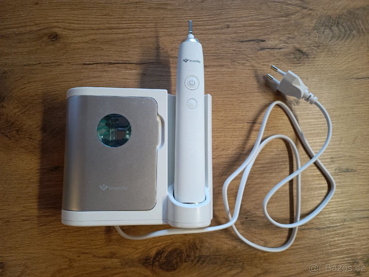 Sonický zubní kartáček SonicBrush UV