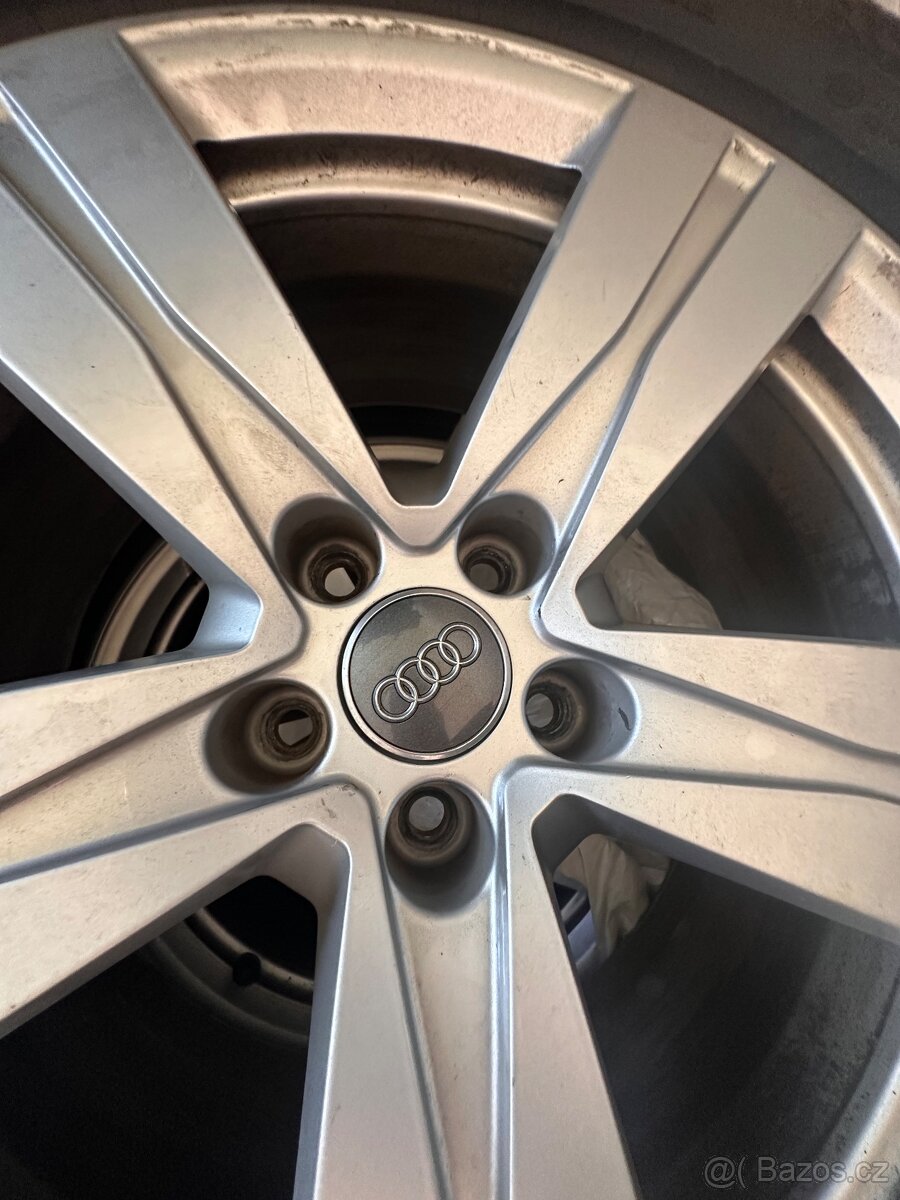 Prodám zimní kompletní sadu kol Audi s pneumatikami Continen