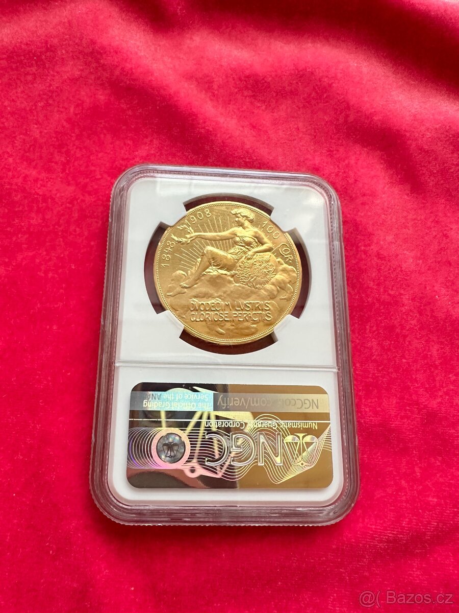 Dáma v oblacích - zlatá výroční stokoruna FJI