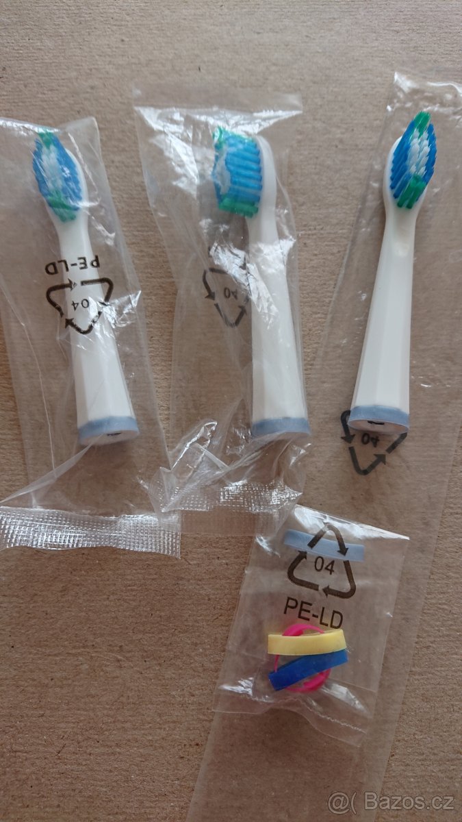 Remington, náhradní zubní kartáčky.