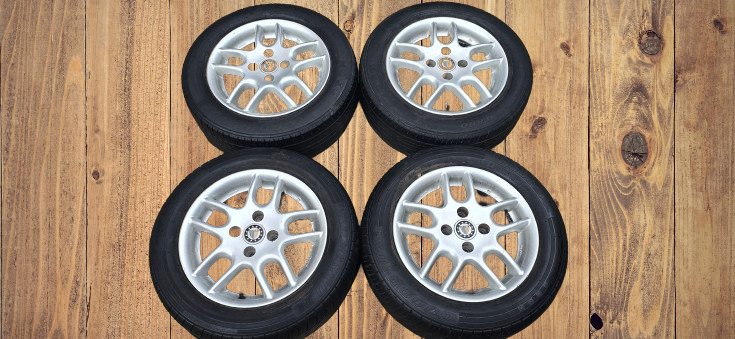 ALU 14" 4x100 ET38 s celoročními pneu 185/60/14