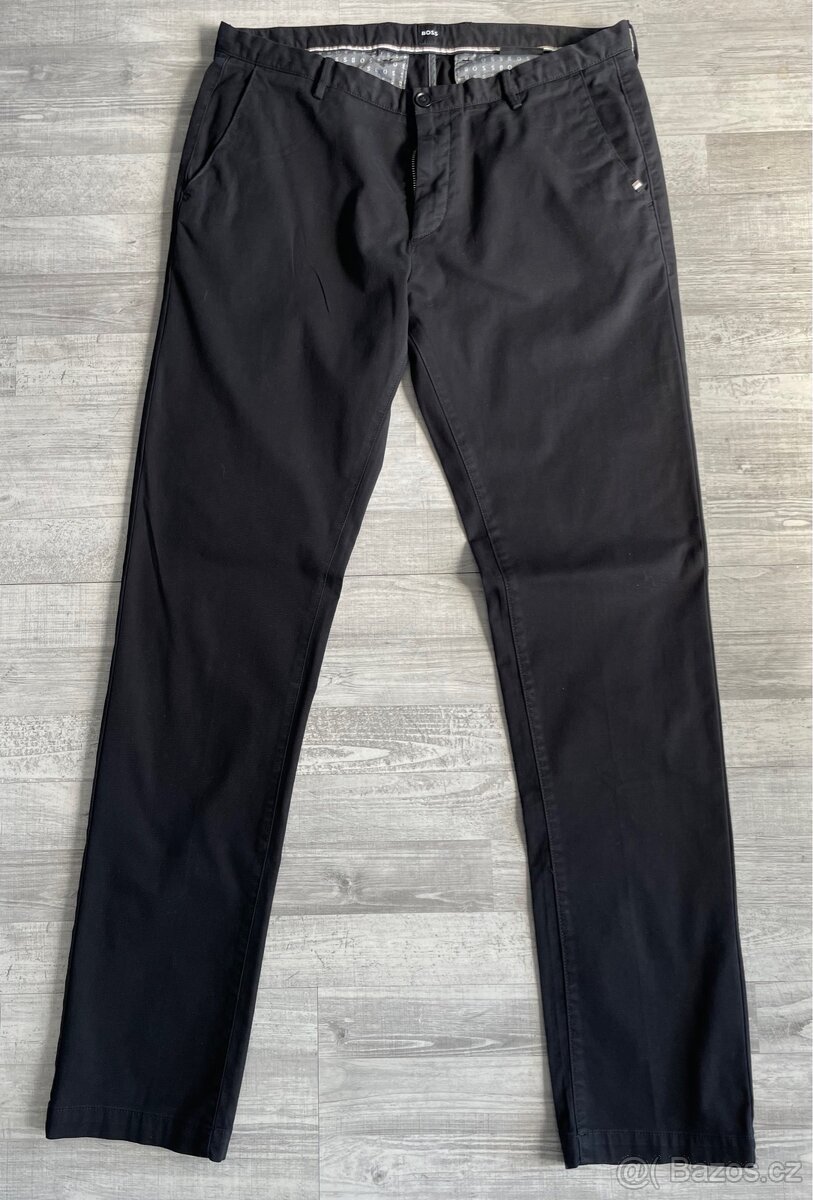 Černé kalhoty Boss slim fit RICE. Velikost 50