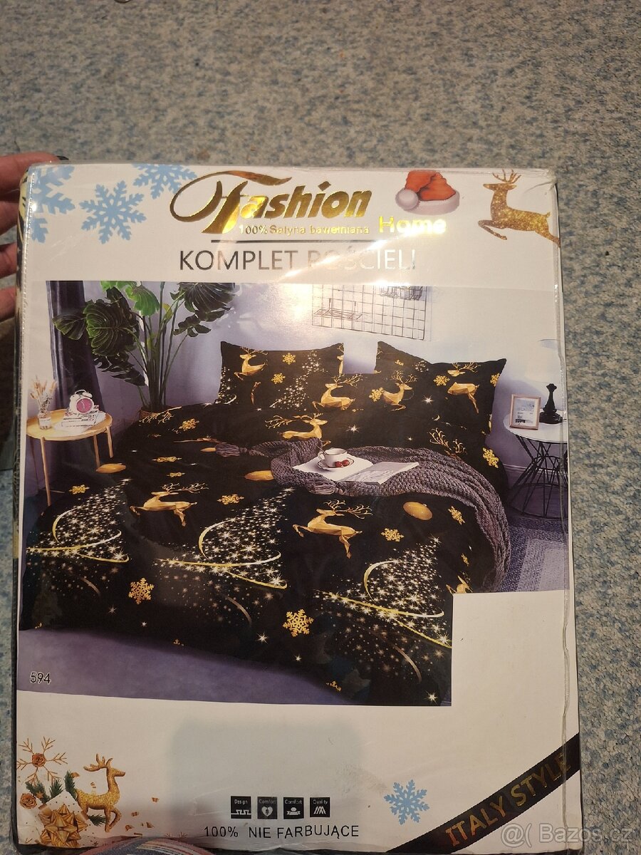 Vánoční povlečení černo-zlaté s motivy jelenů a hvězd