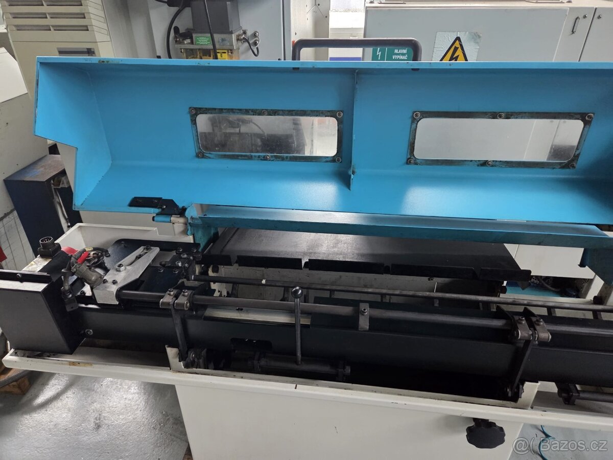 Tyčový podavač k soustruhu