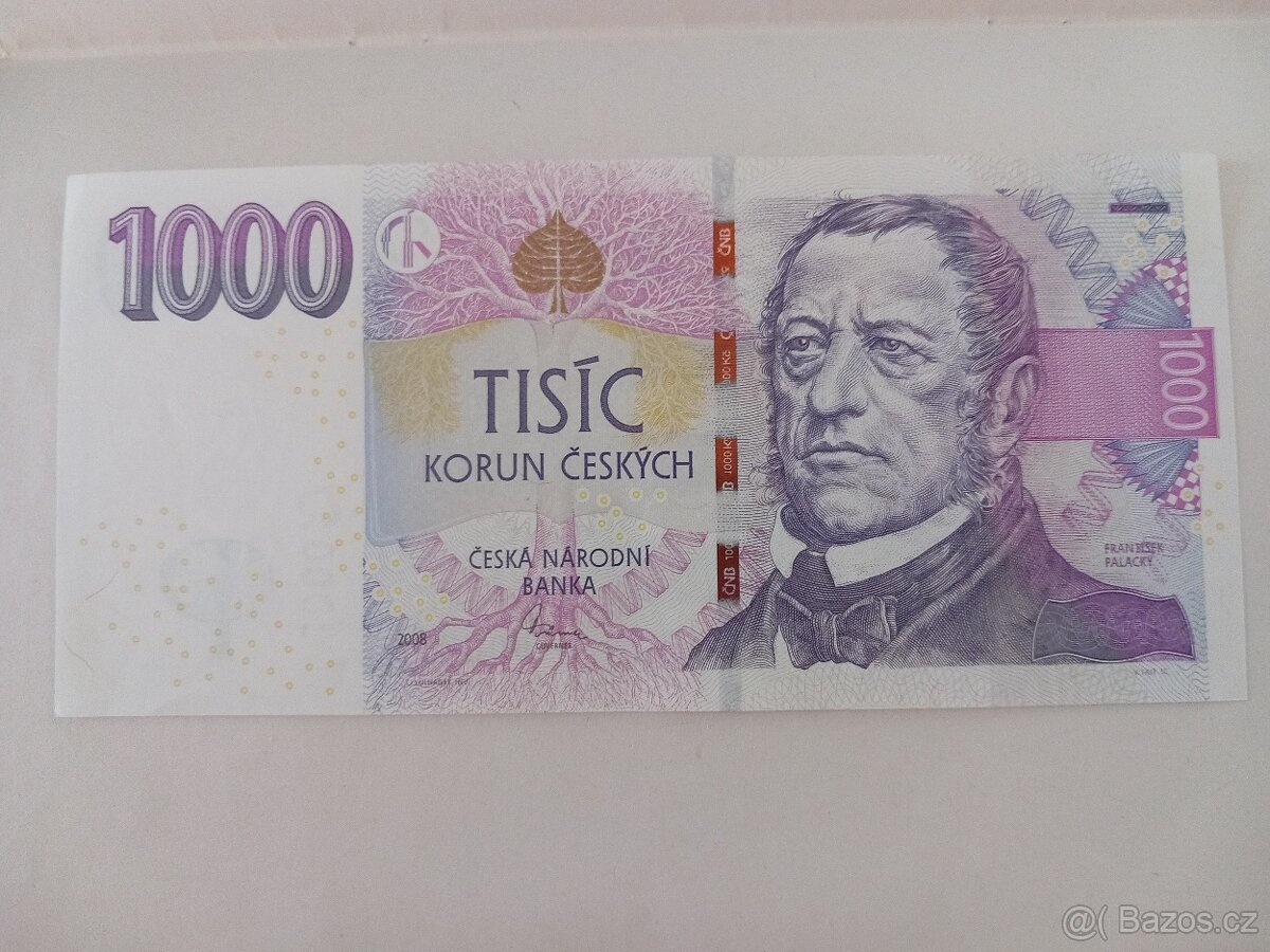 Bankovky UNC - 8 x 100kč, 2 x 200kč, 1 x 1000kč.