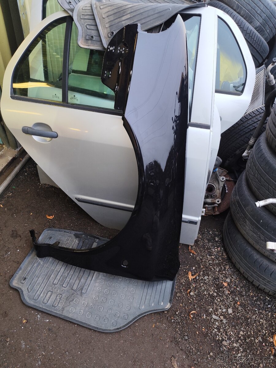 Levý přední blatník - Škoda Octavia I - 9910