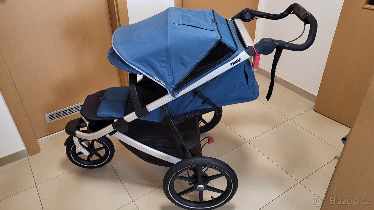 Thule Urban Glide 2 (2023) s korbičkou.