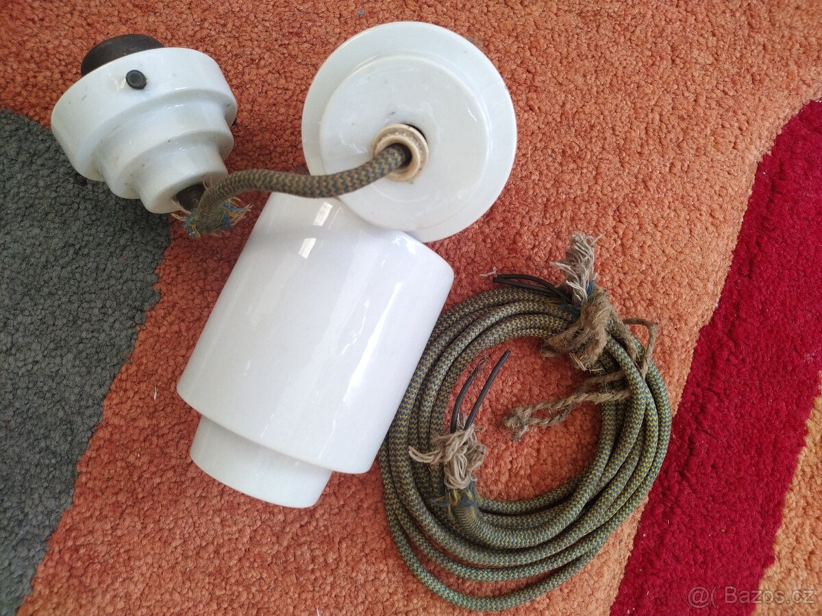 Stará porcelánová stahovačka