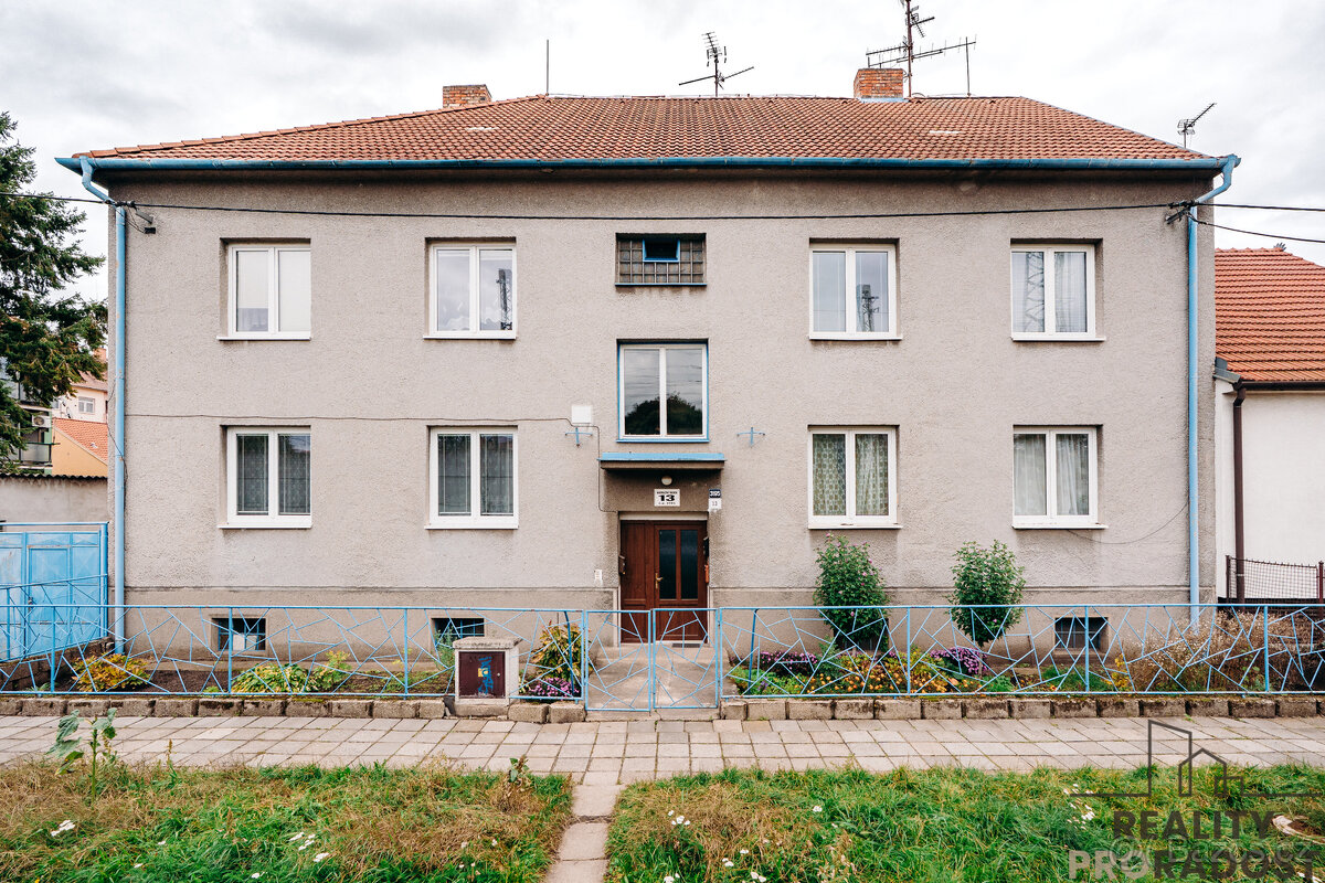 Prodej bytu 3+1 71m² se zahrádkou a dvougaráží – Nádražní