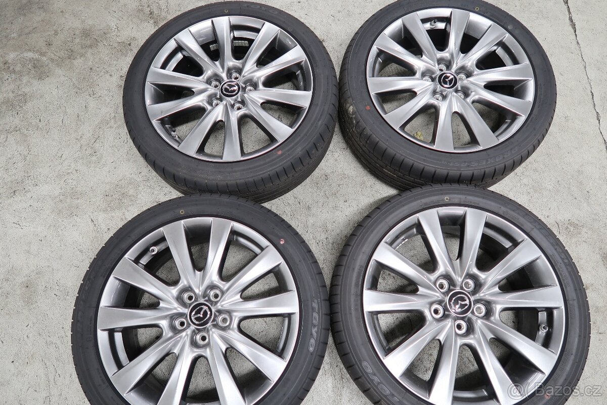 Letní komplet kola originál pro Mazda 3, pneu 215/45 R18
