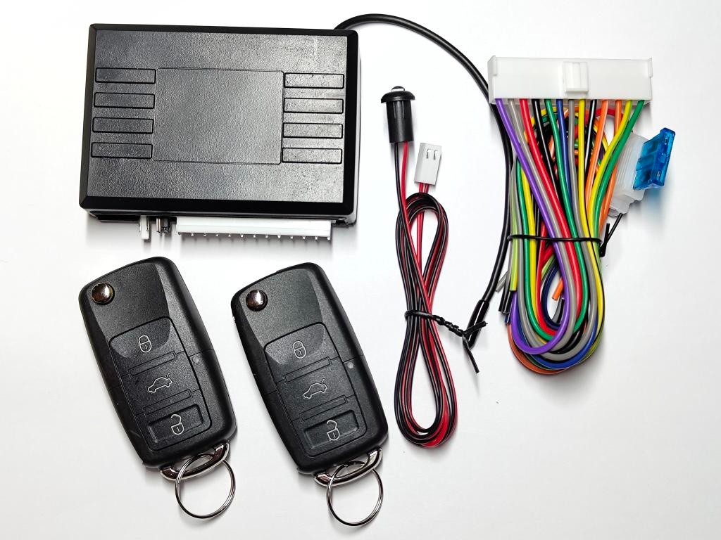 Dálkové ovládání k centrálnímu zamykání. Logo ke klíči v ce