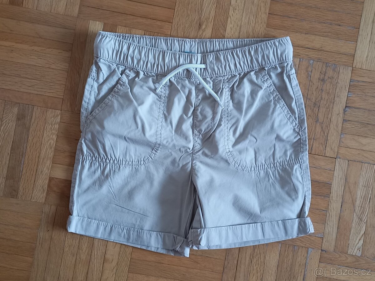 Plátěné kraťasy béžové KIK vel. 128/134