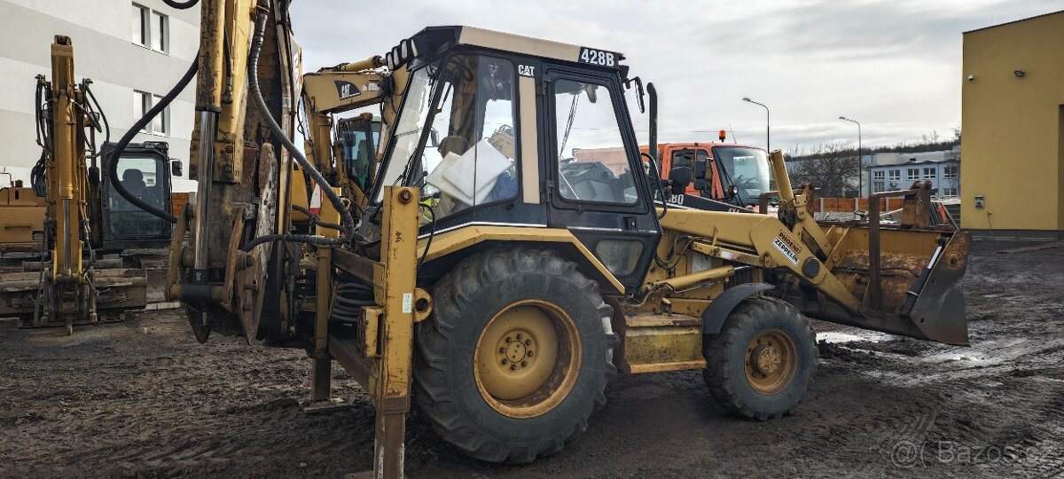 Traktor.- bagr Caterpillar 428B