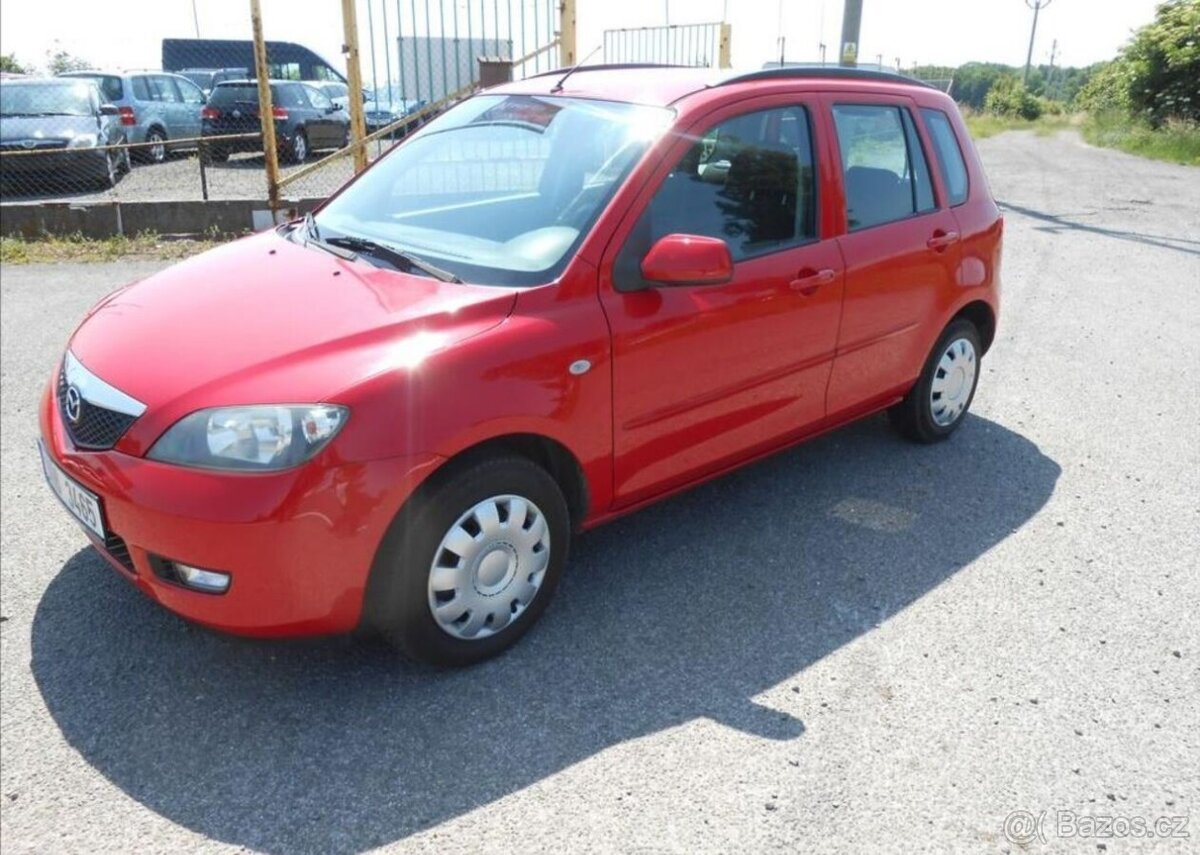 Mazda 2 1,4 59 kW KLIMA Historie benzín