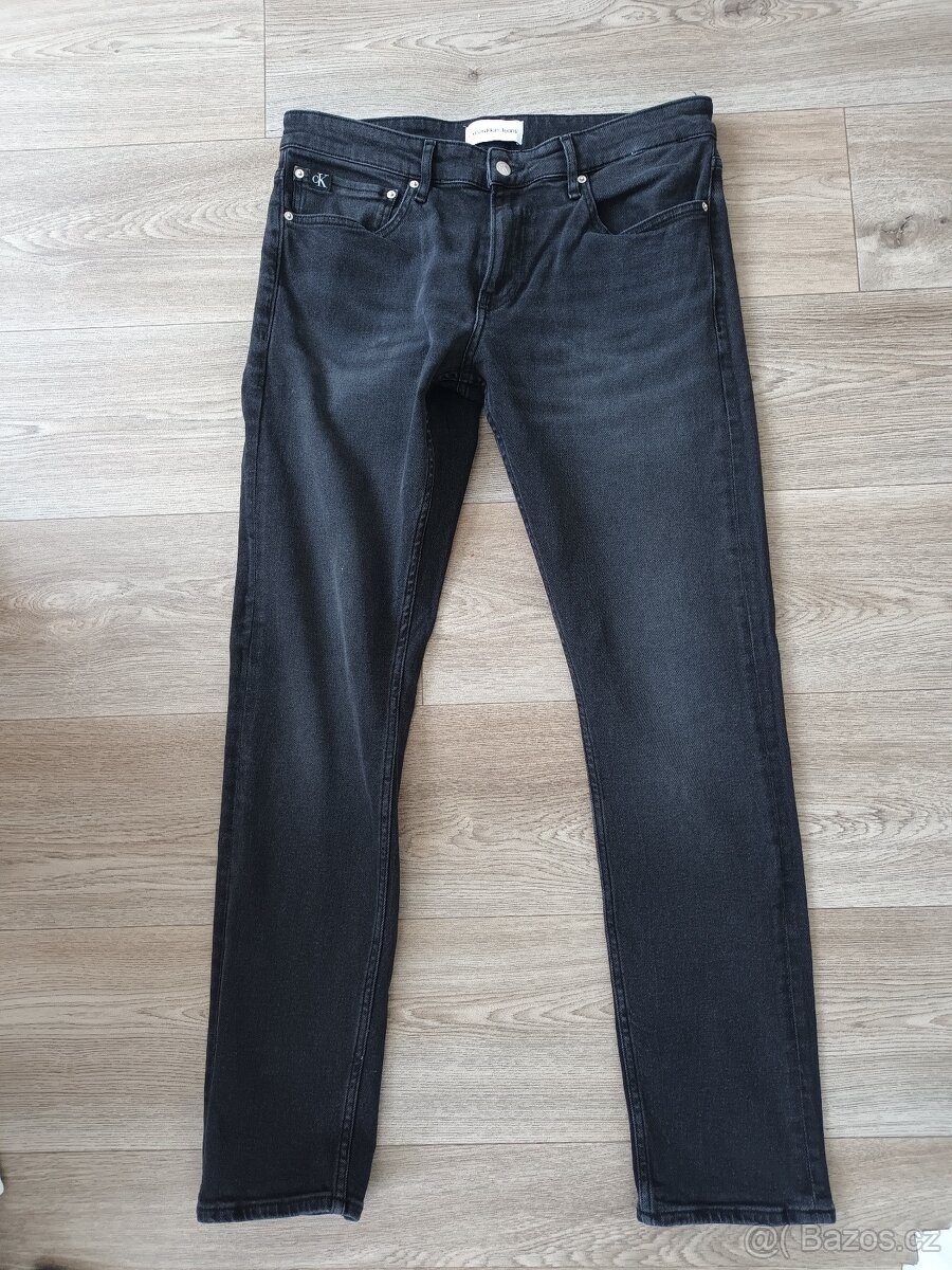 Nové pánské džíny Calvin Klein, vel. 33