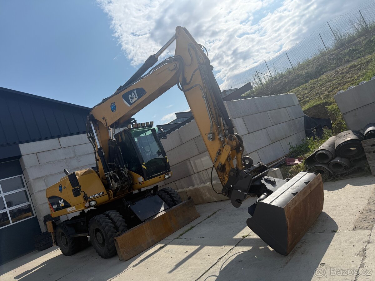 Prodám Kolový bagr 315 D