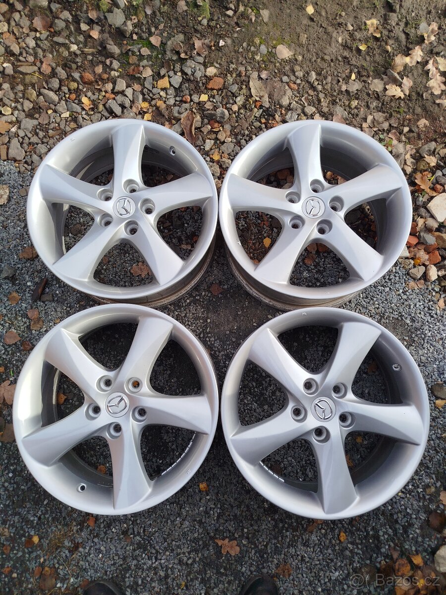 ALU Mazda 5x114,3 R17 7J ET-55 střed 67mm