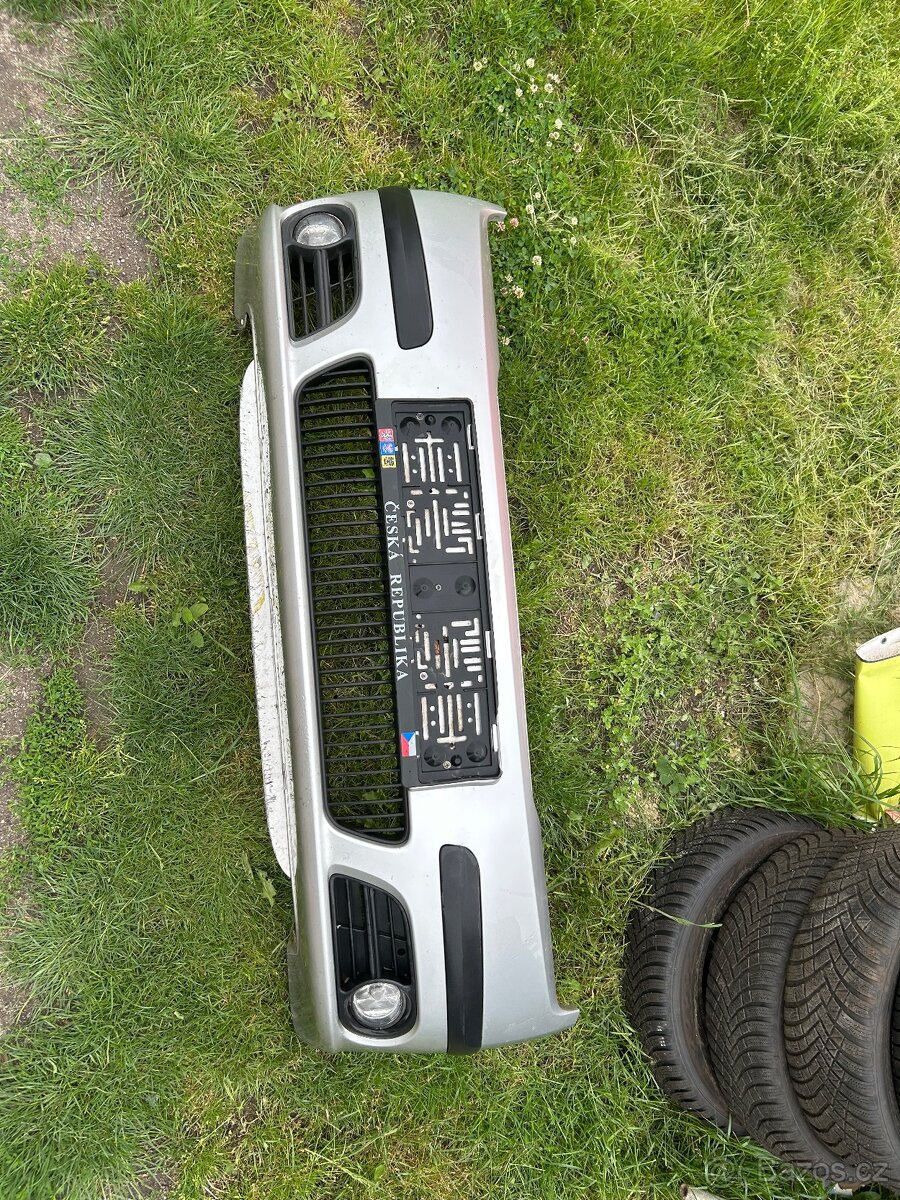 Škoda Fabia 1 přední nárazník 9102 stříbrný
