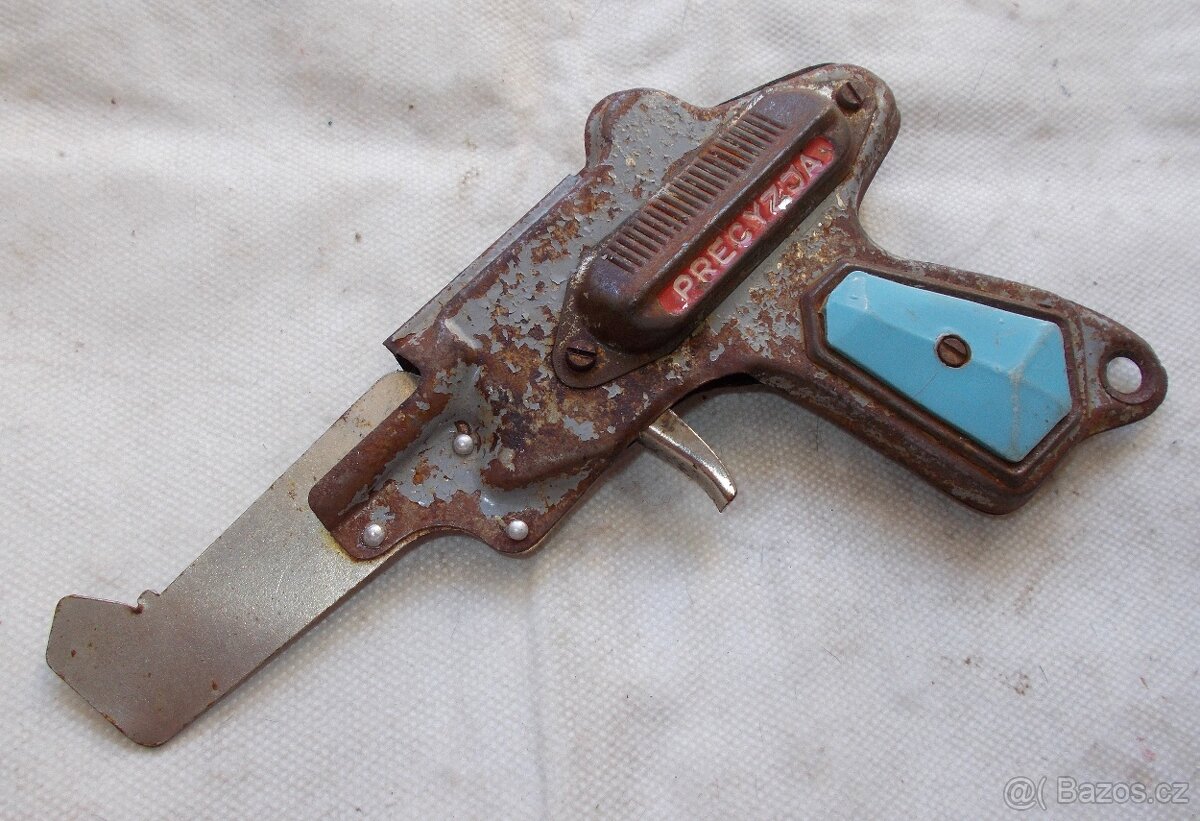 Dětská pistole, plechová hračka.