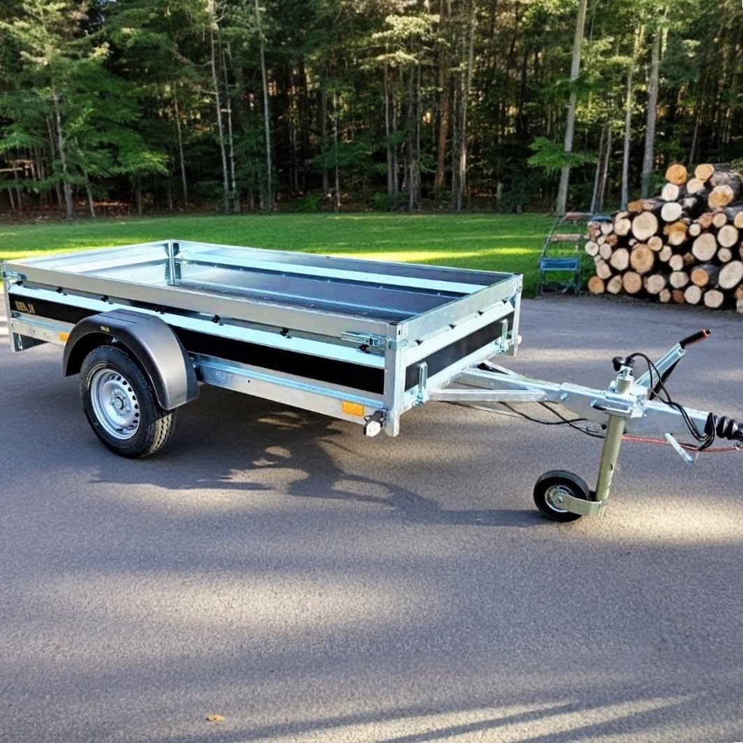 Brzděný přívěsný vozík 1300Kg, 2,65m x 1,30m, svařovaný rám
