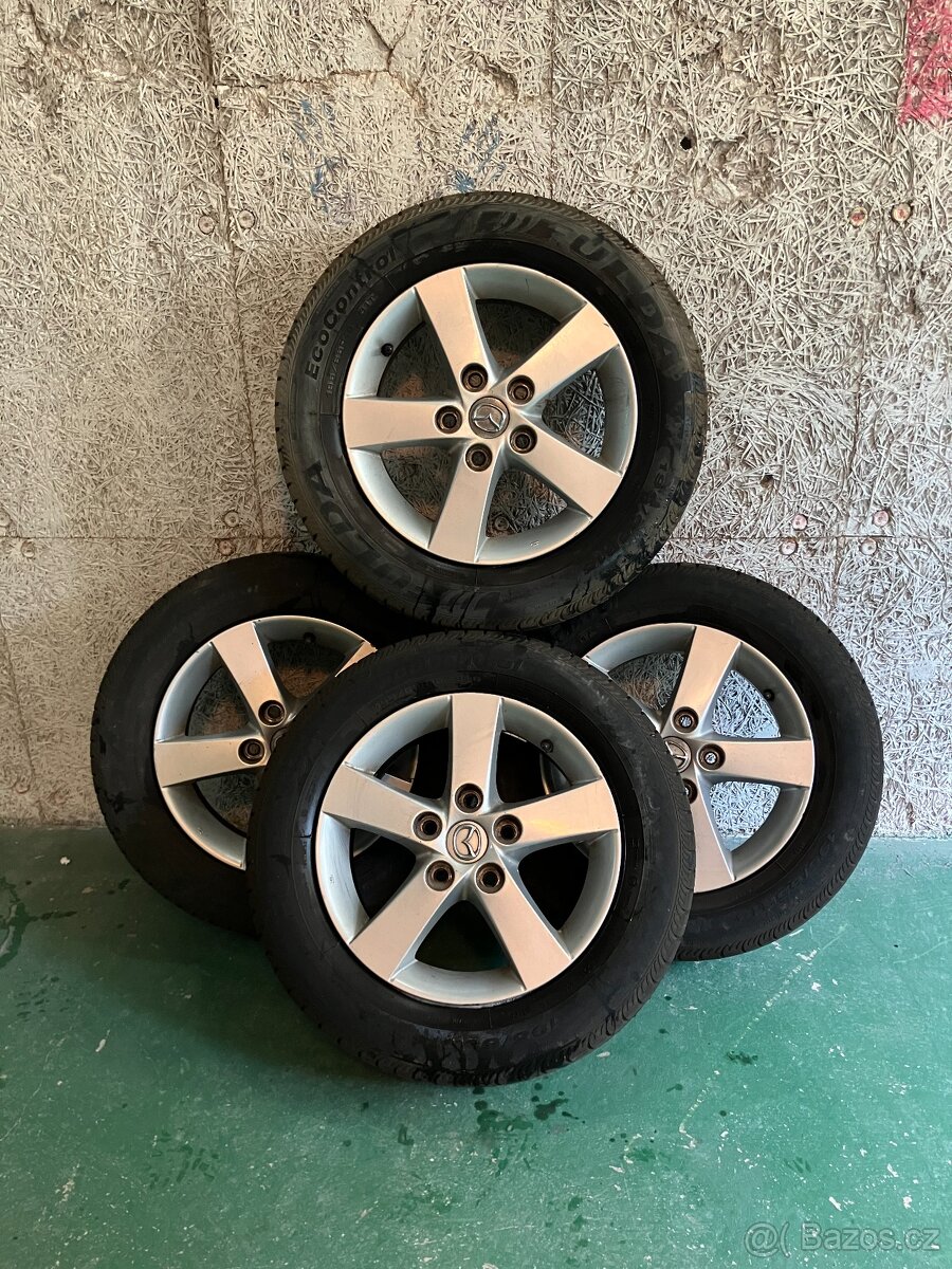 Hliníkové ráfky Mazda 5 - 4ks + pneu 3000 Kč