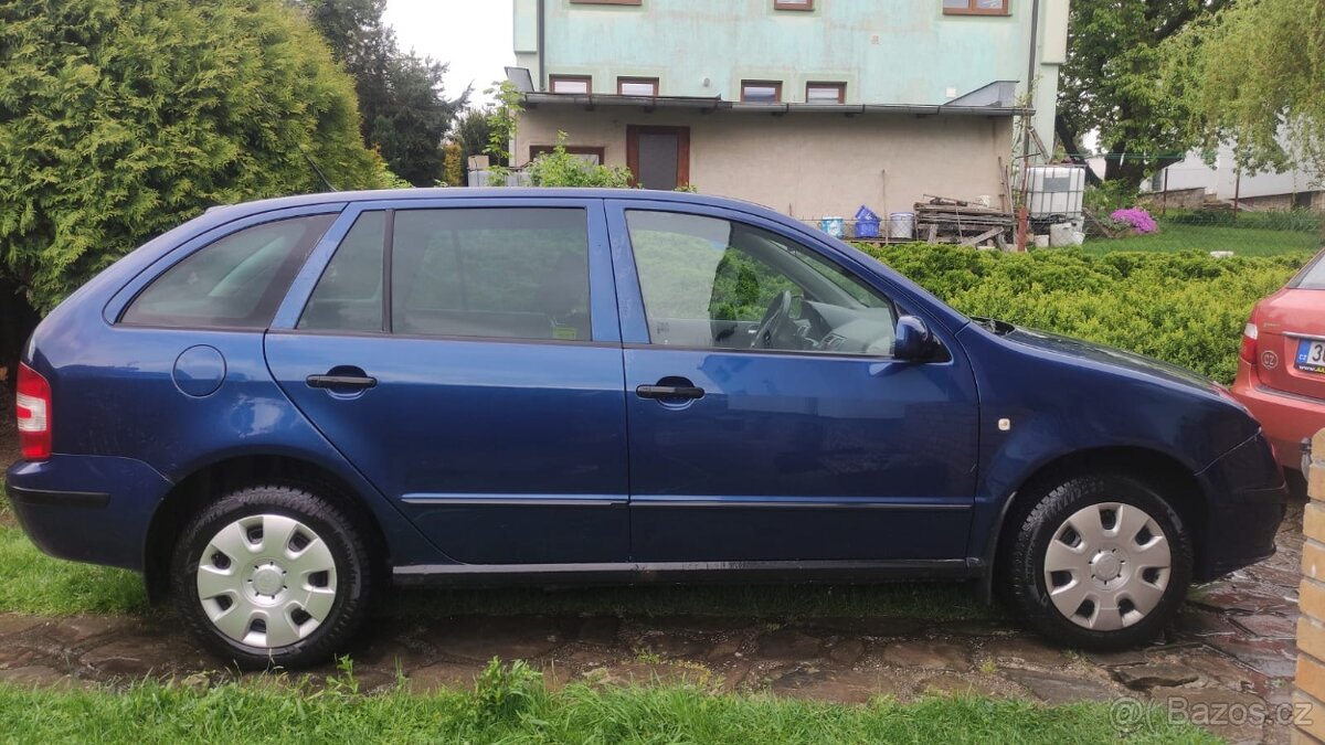 Škoda Fabia + letní a zimní pneu