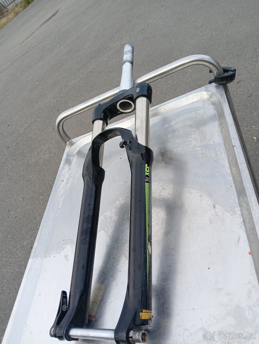 Vidlice SUNTOUR 27.5 10xcr 120mm s pevnou osou