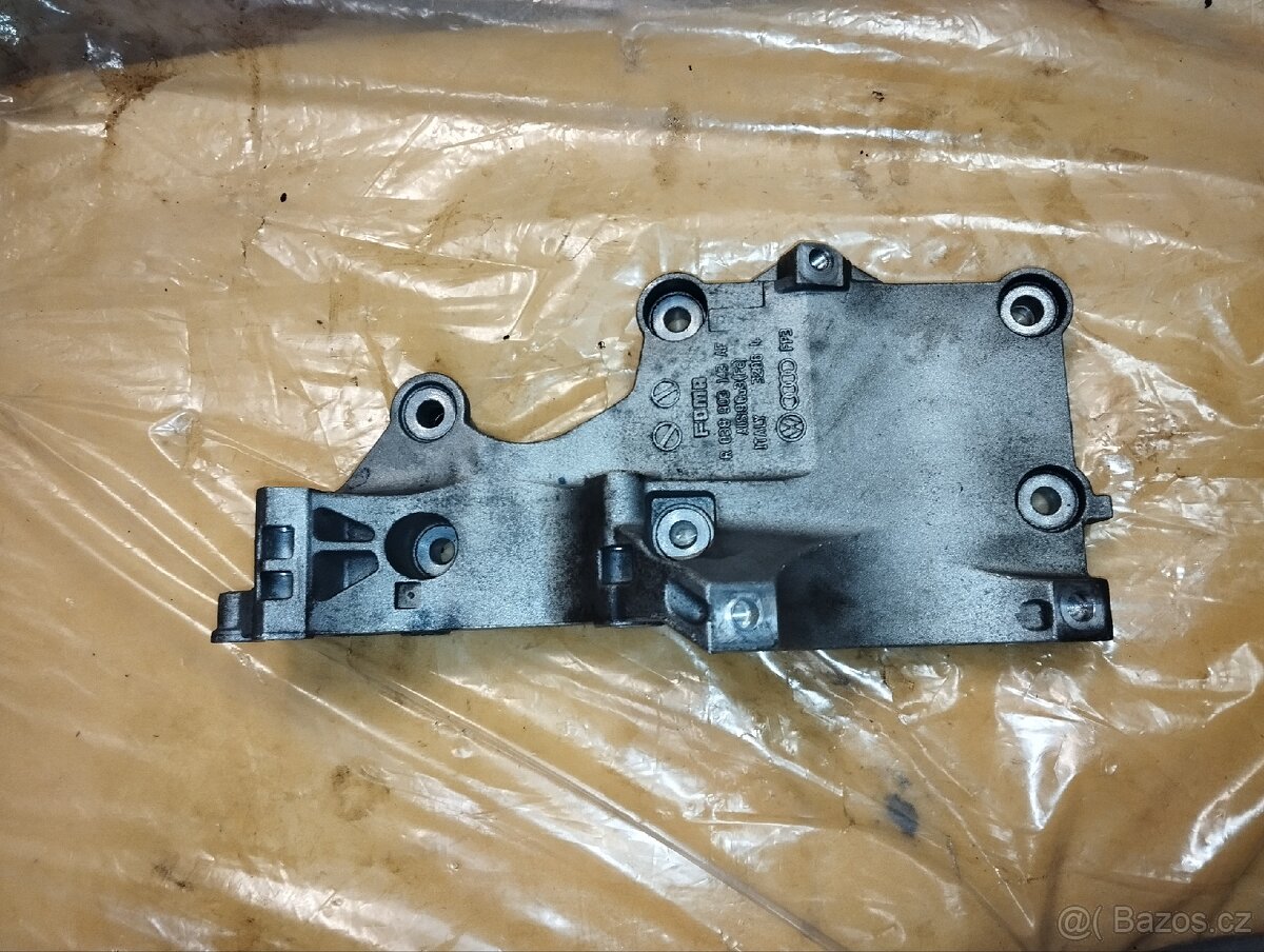 Držák alternátoru a klimakompresoru motor 1.9tdi 77kw bxe