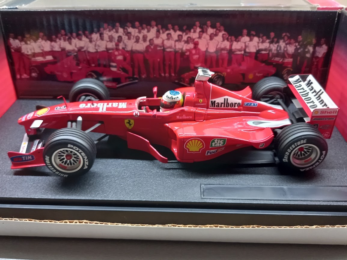 F1 FERRARI F399 1999 MARLBORO SCHUMACHER HOTWHEELS 1:18