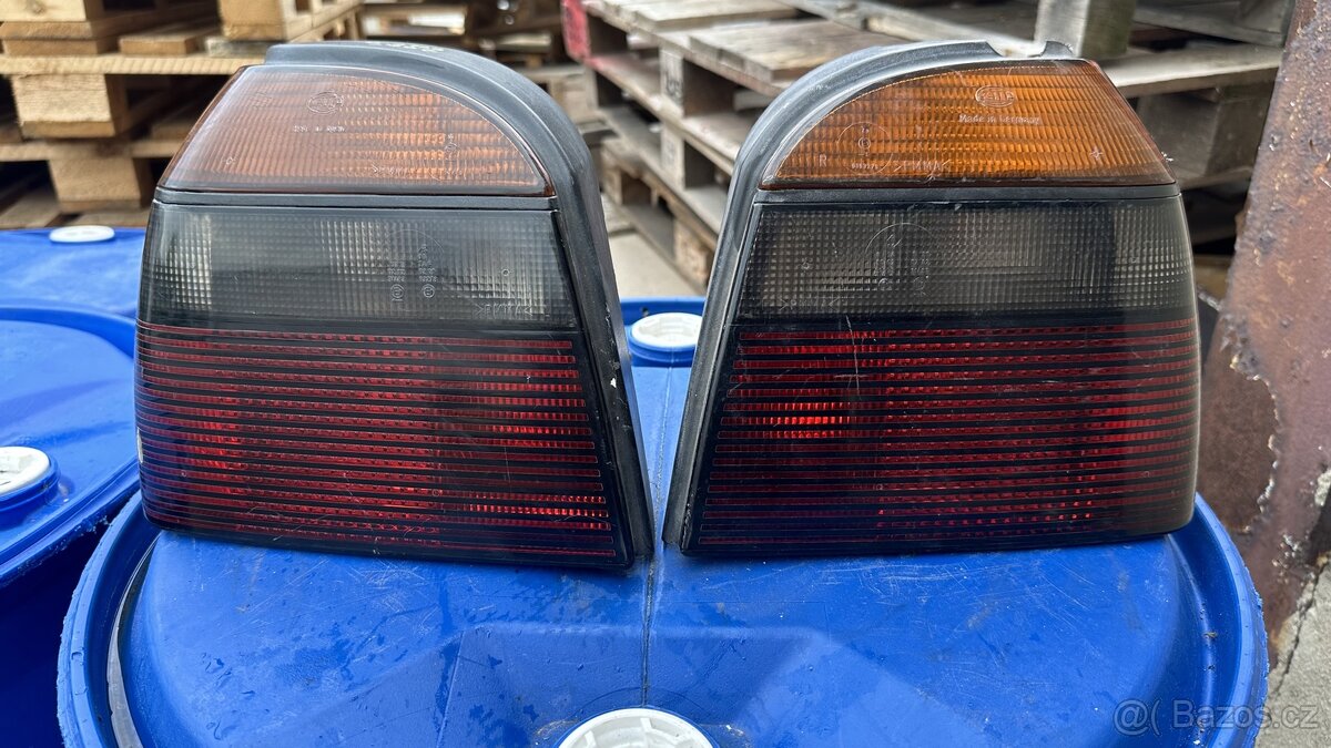 Světla golf mk3 hella magic color black