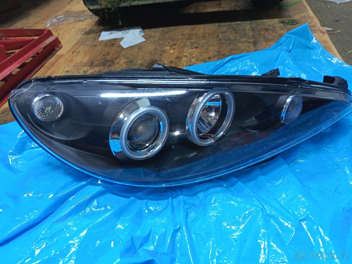 Přední světlomet 1ks pouze pravý na Peugeot 206 02 -07.