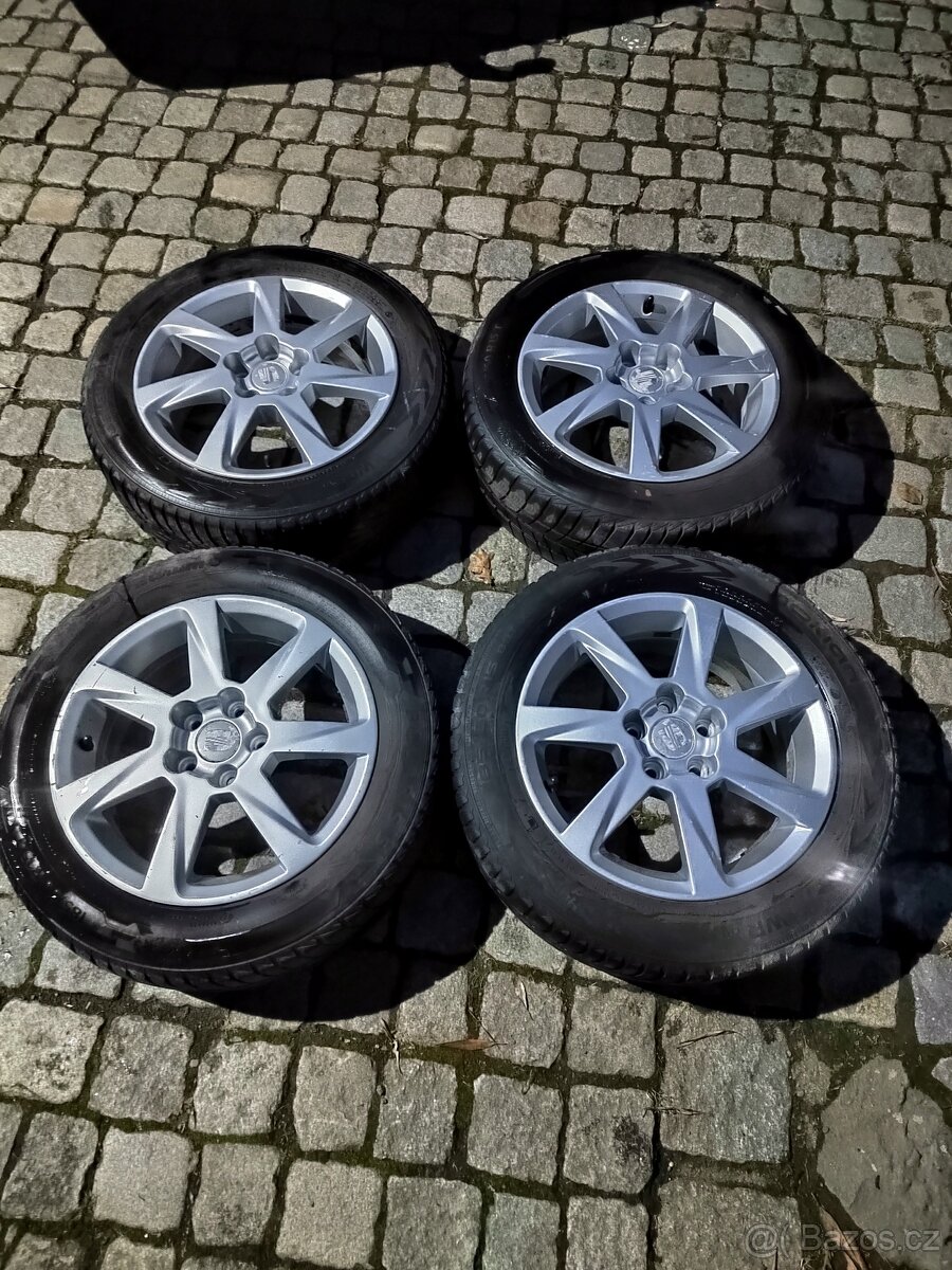 Prodám orig alu 15 Seat Ibiza 5x100 ET 38 zimní pneu