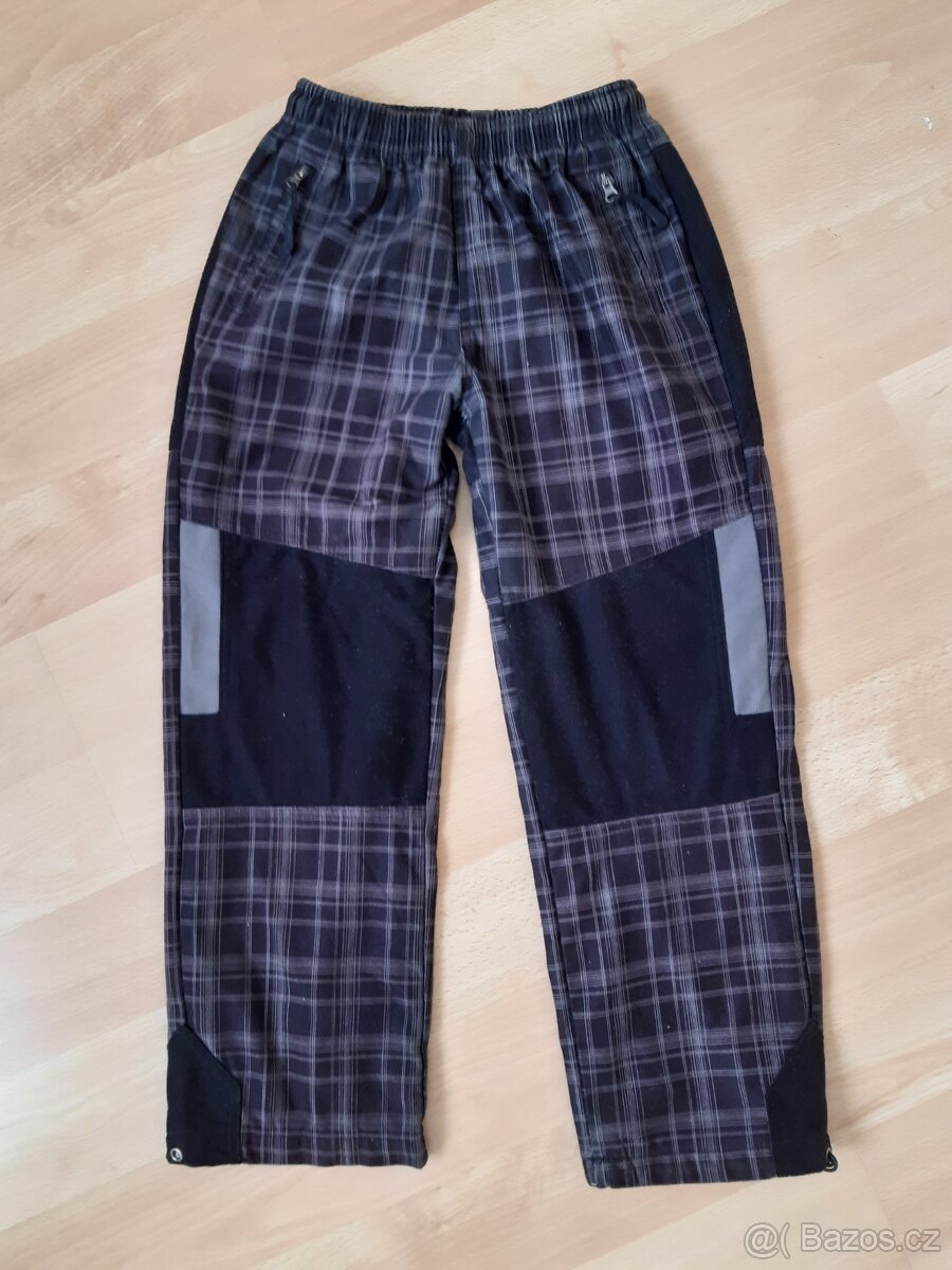 Zimní zateplené kalhoty vel. 134