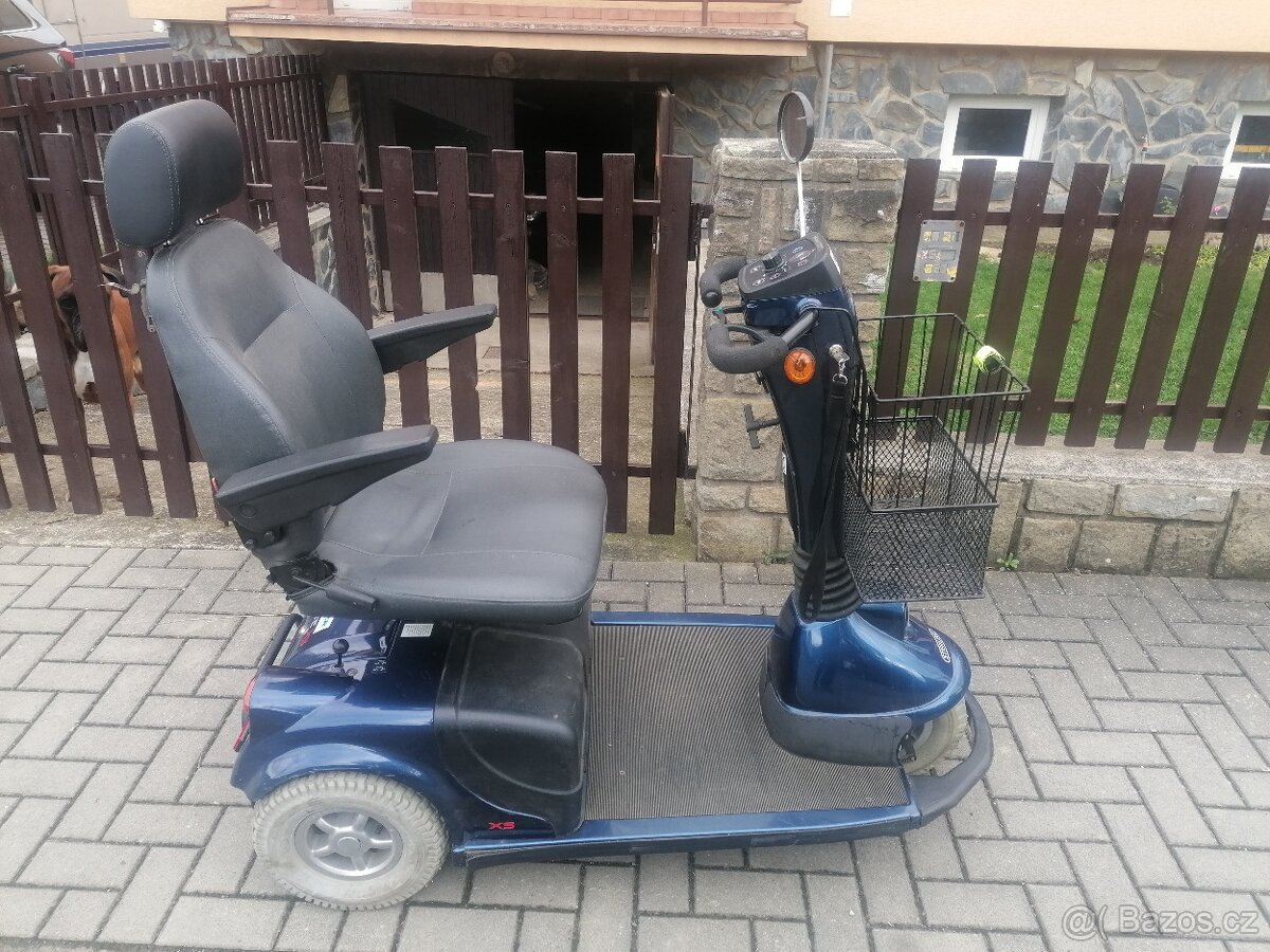 Elekro tříkolka.