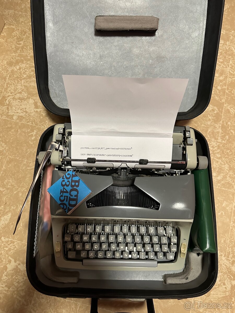 Psaci stroj kufrikovy