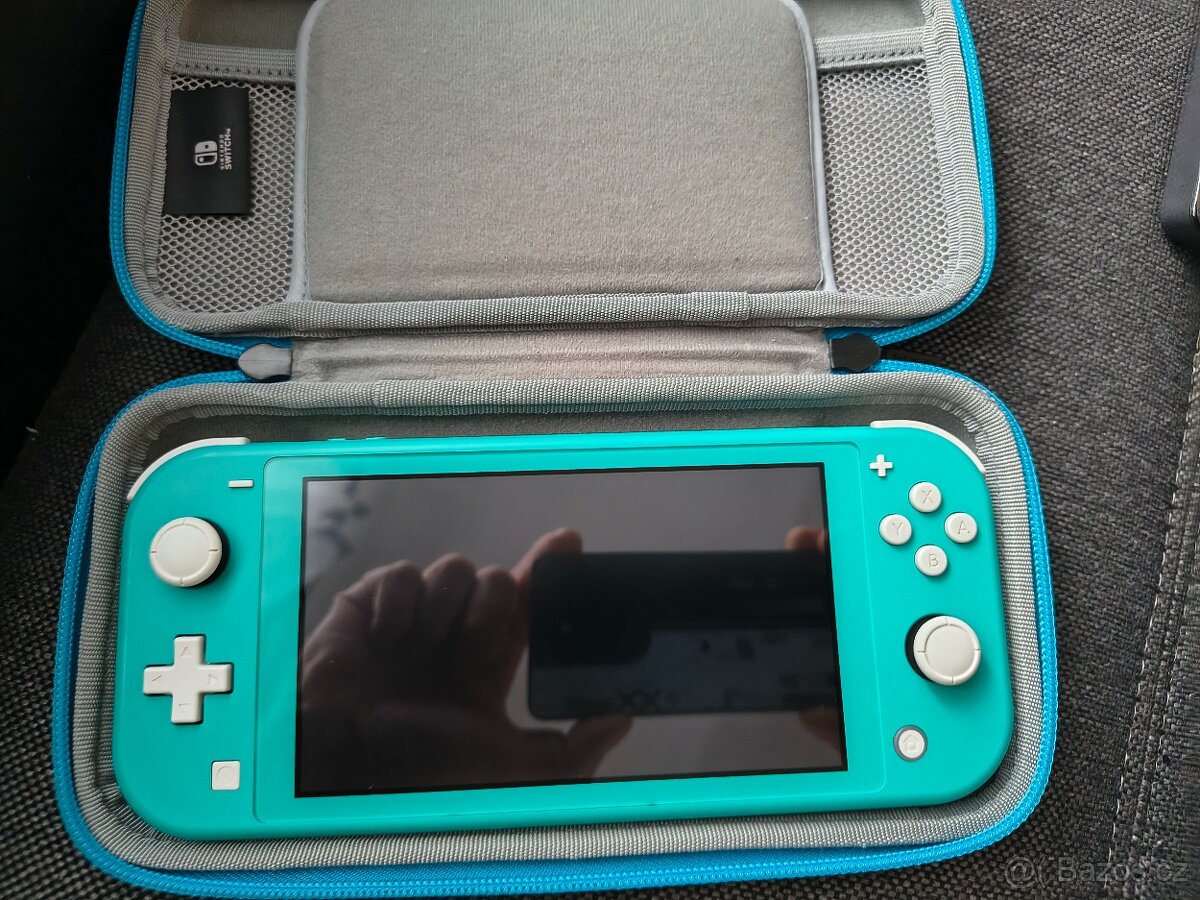 Nintendo switch lite + hry