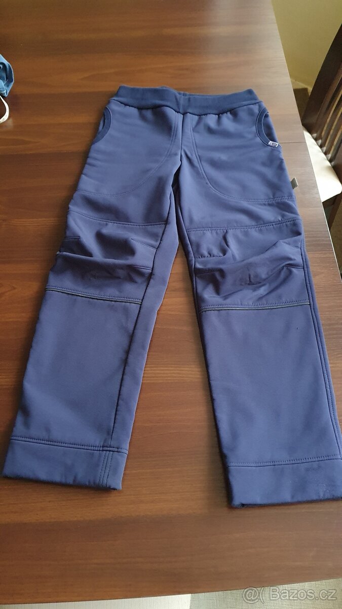 Zimní softshellové kalhoty vel. 146/152 - UNI