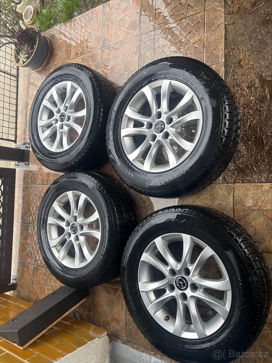 Mazda Alu kola 5x114.3 R16 s pneu