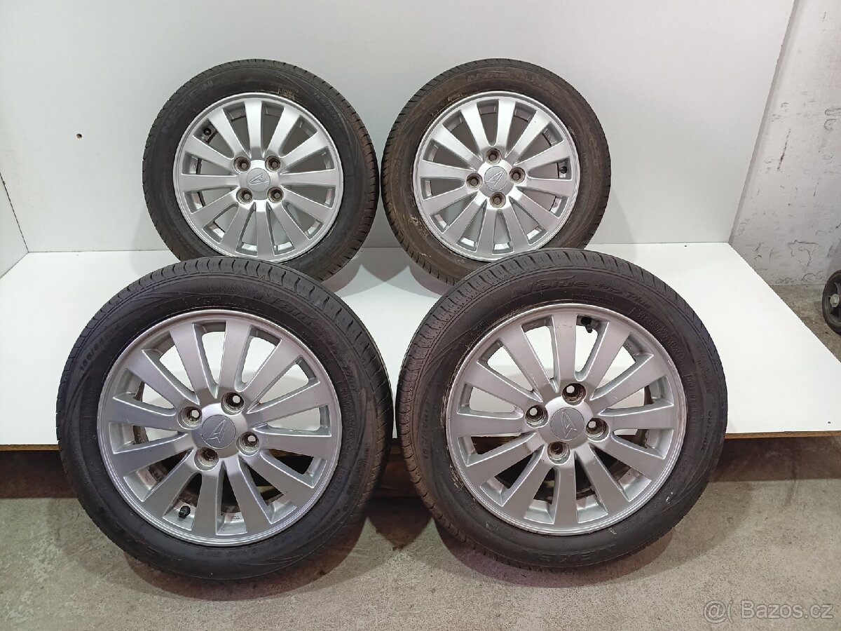 Alu kola Daihatsu 4x100 R14 pneu 155/65/14/Nexen