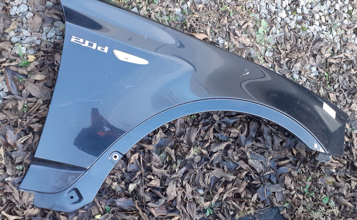 BMW X3 e83 - Pravý přední blatník