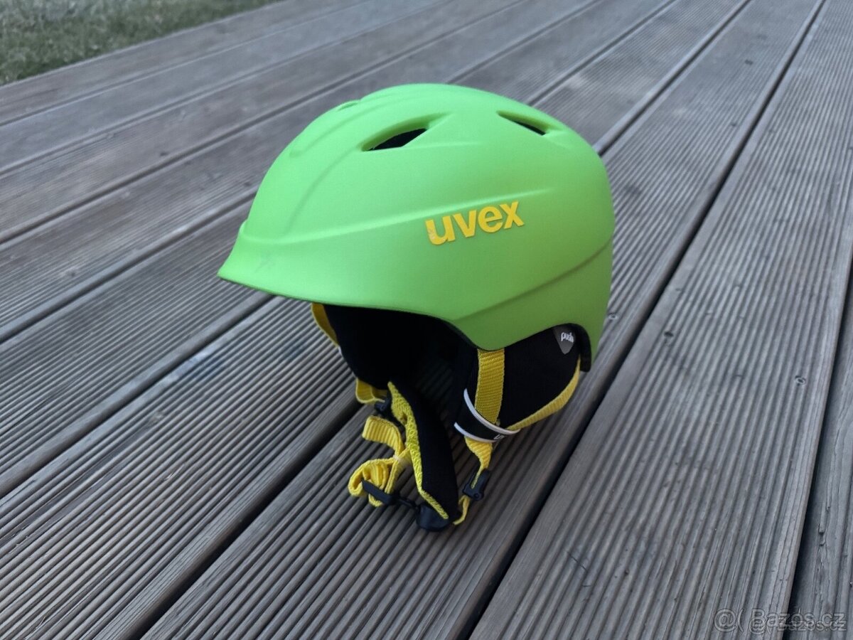 Lyžařská dětská helma Uvex zelená 52-54cm