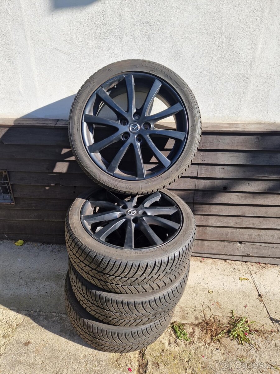 Kompletní kola Mazda 3 – alu disky + celoroční pneumatiky