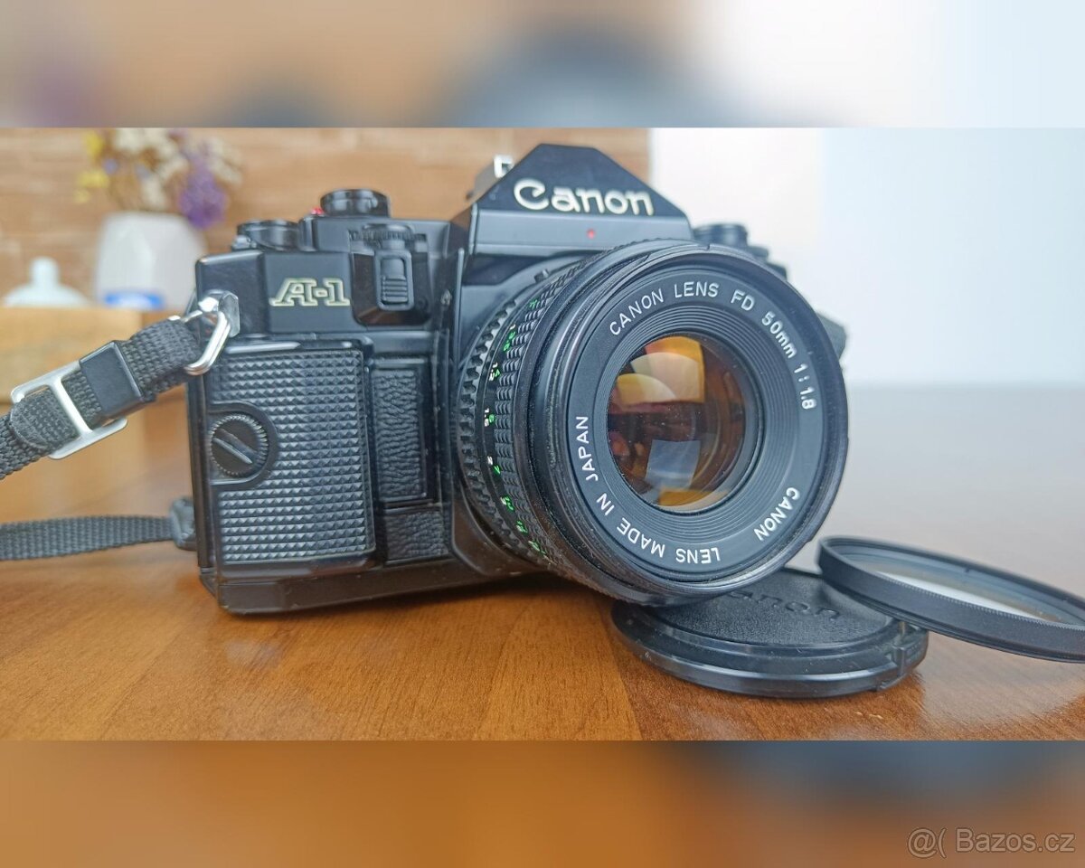 Canon AE-1 black s objektivem Canon Lens 1.8/50 mm, FD
