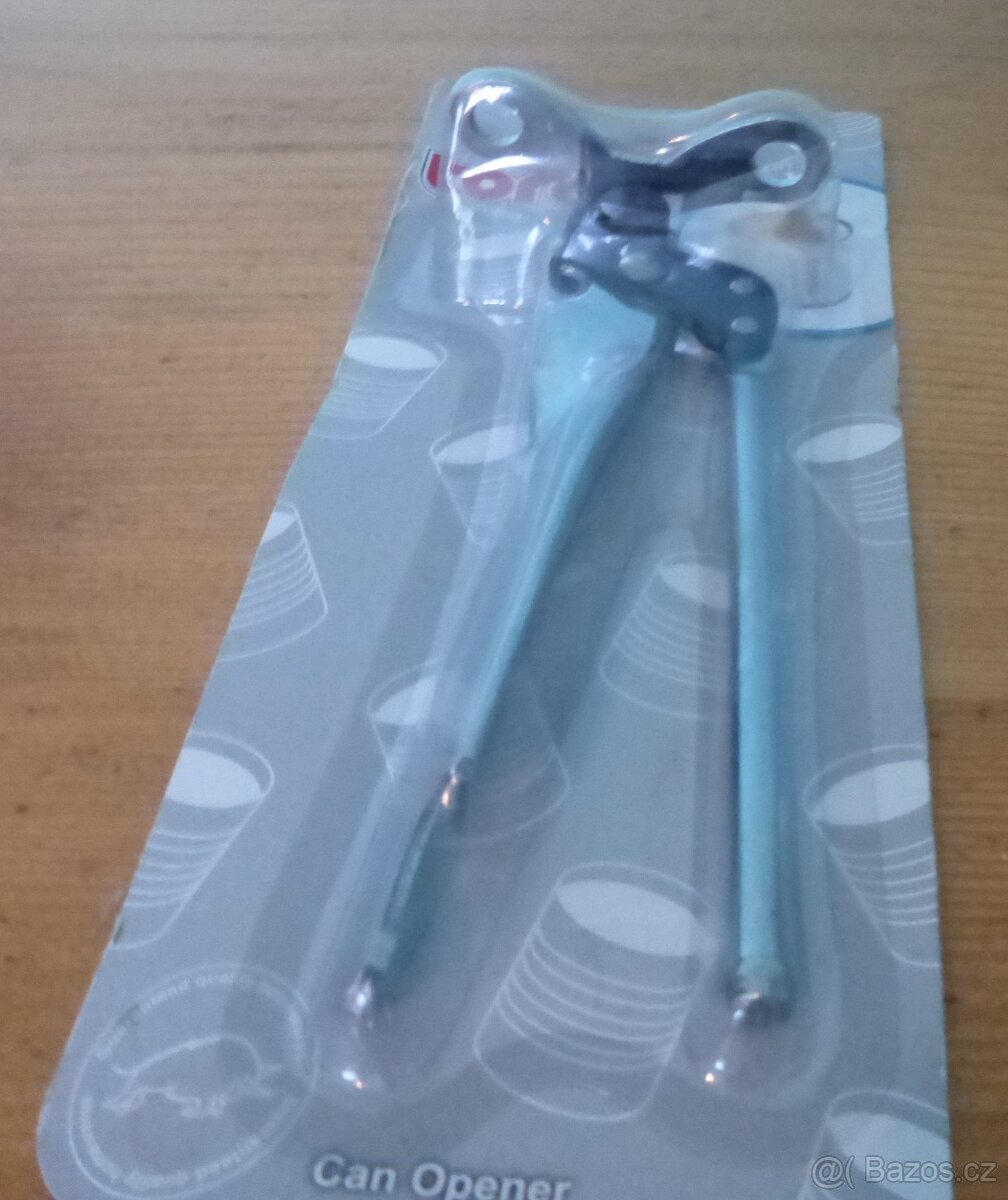 OTIRÁK NA KONZERVY -- NOVÝ