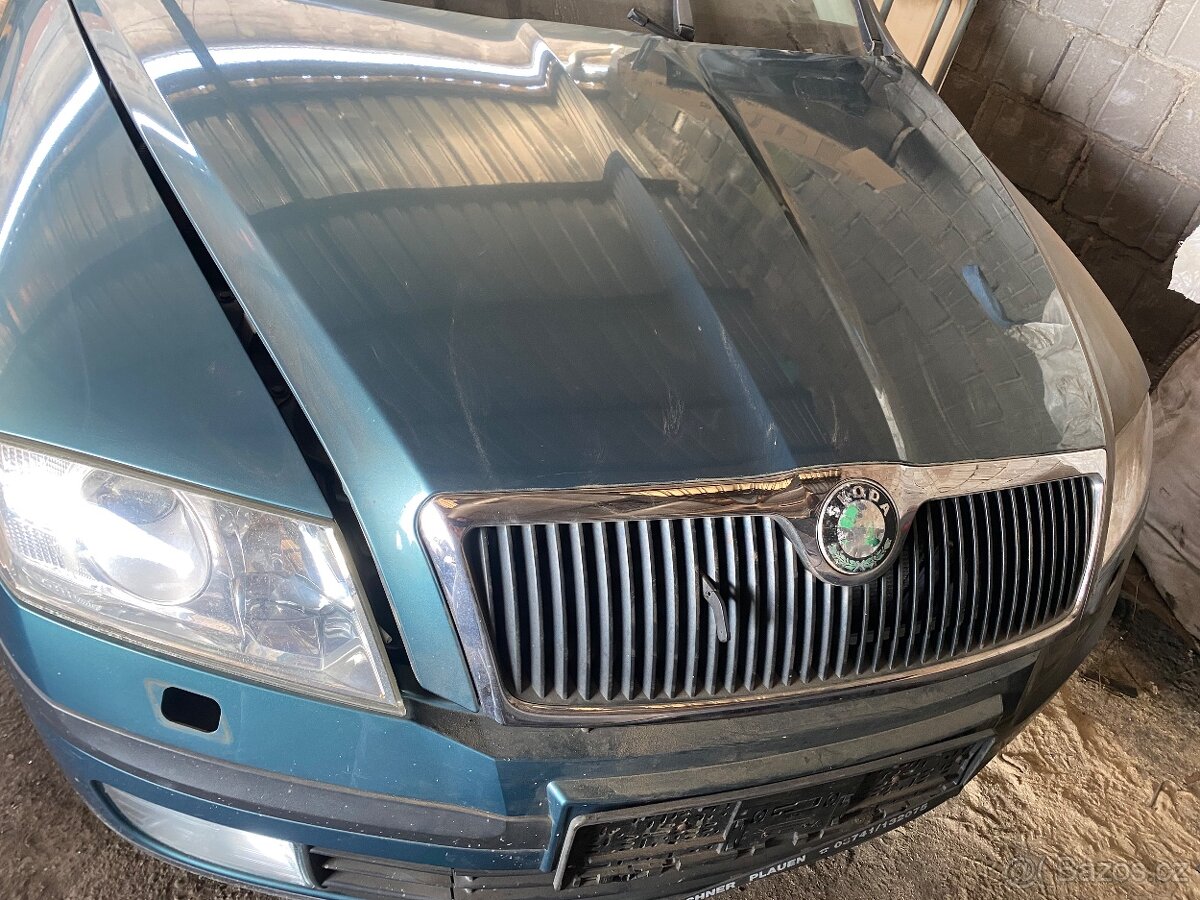 Octavia 2 facelift,1,6i,75KW,kód barvy 9598