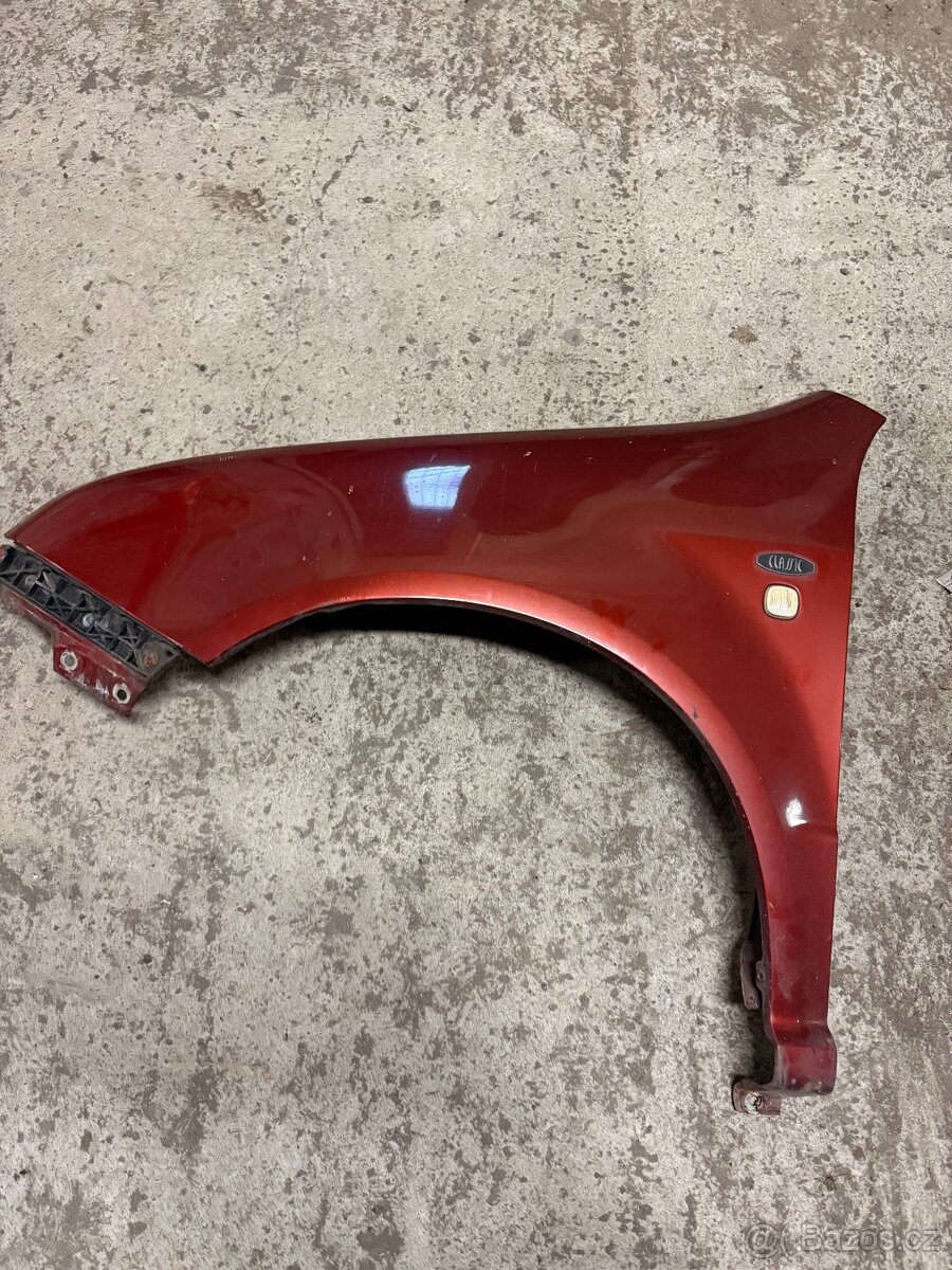 Levý blatník Škoda Fabia 1