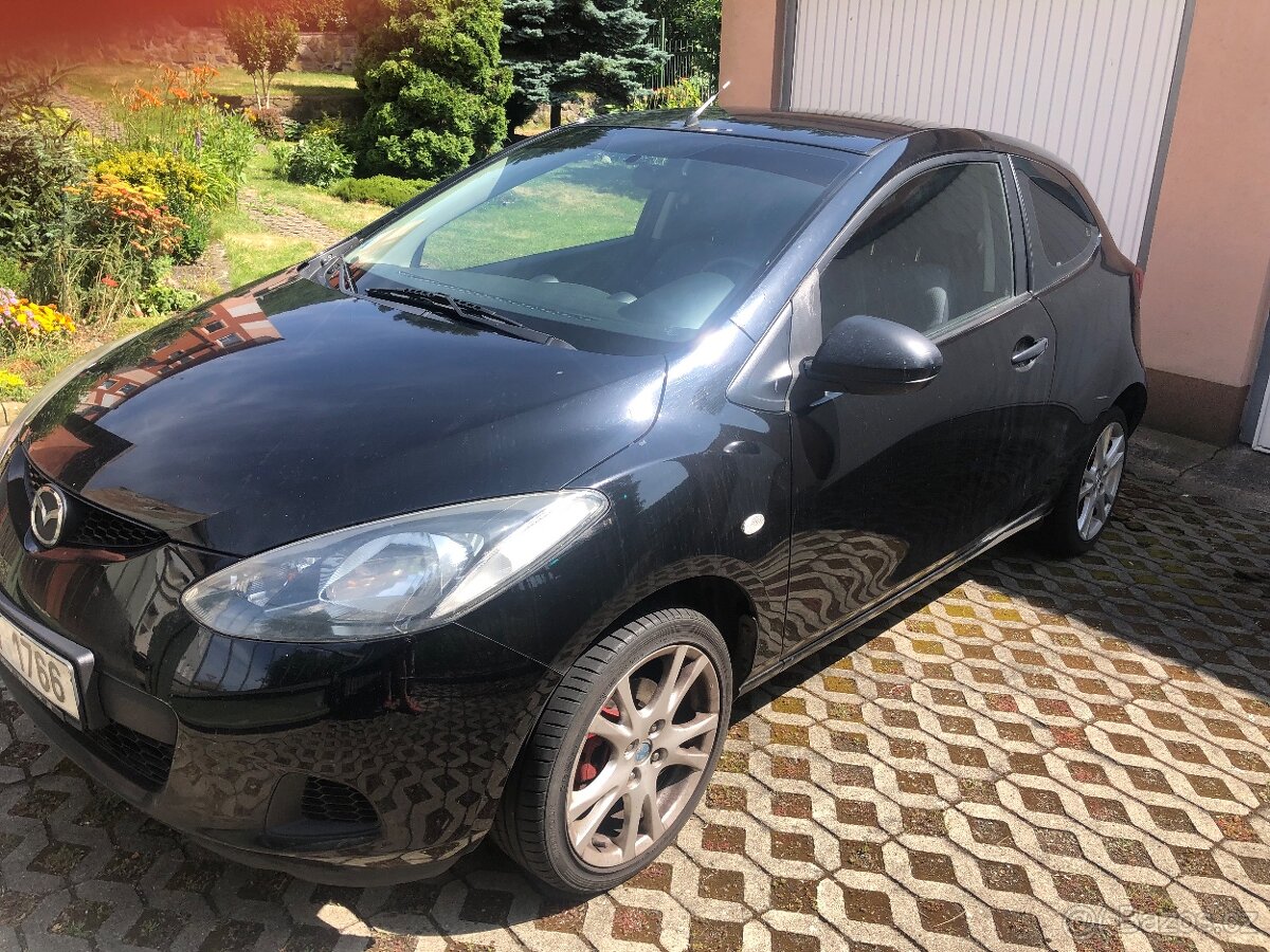 Mazda 2 - 1,4 benzín