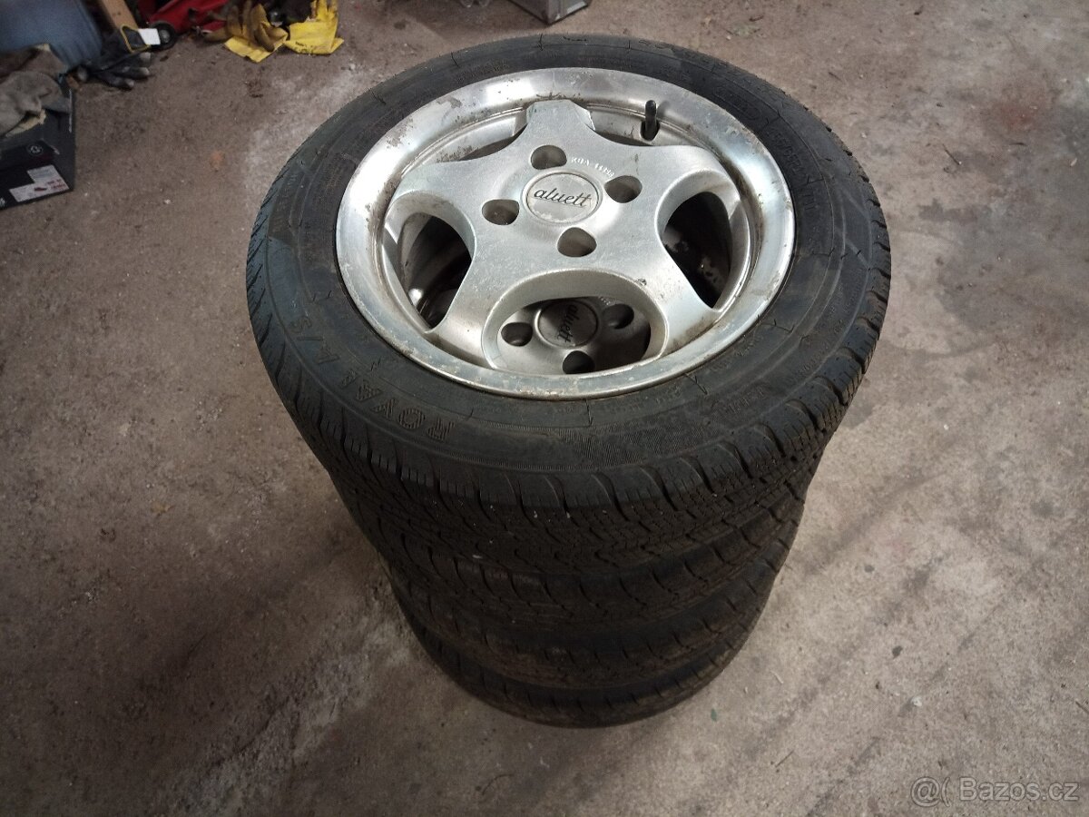 Alu kola 4x100 + zánovní celoroční pneu 155/65R13